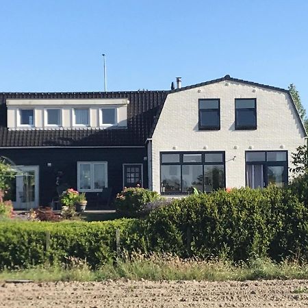 T Huuske Tuinappartement Met Fantastisch Uitzicht, Nabij Zee Zonnemaire Exterior foto